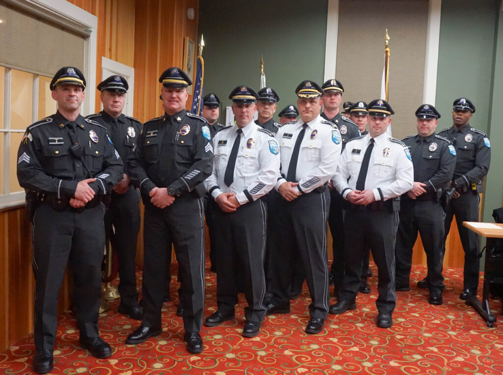 Chief Paliotta stands with fellow officers after being sworn in. Photo by Stephanie Bernaba, Special to the Sun